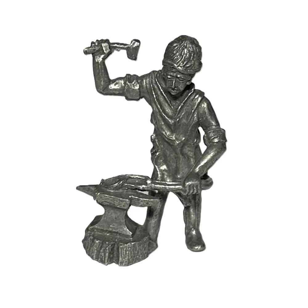 Tin Sculpture Of Working Blacksmith